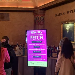 Guests lined up to purchase speciality cocktail drinks   in celebration of "Mean Girls    " the musical  !