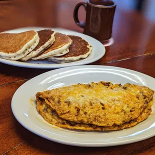 Chorizo omelette with 4 small pancakes.