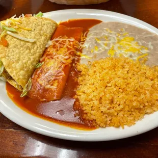 The cheese enchilada and beef taco plate