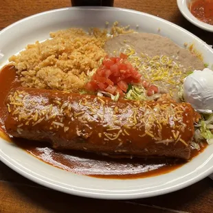 Mixed burrito chimichanga enchilada style with rice and beans