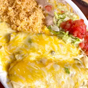 Creamy chicken enchilada combination plate (with rice and beans)