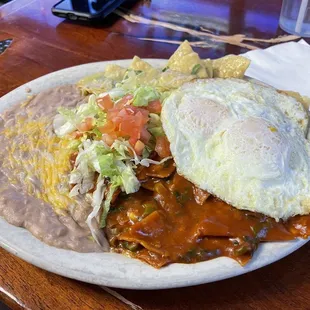 Chilaquiles- breakfast 1/2 green 1/2 red