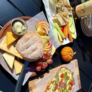 Chicken artichoke, cheese and fruit board, flatbread