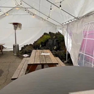 Fountain in the outdoor patio. Heaters &amp; tented enclosure so we don't get too cold here in Sandy.