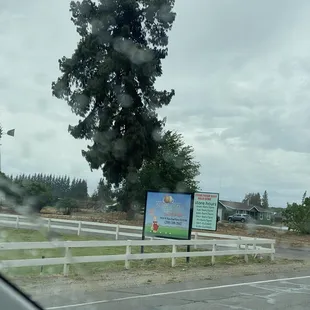 a sign on the side of the road