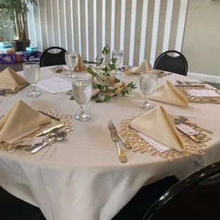 a table set for a wedding reception