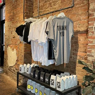 a display of t - shirts and hats