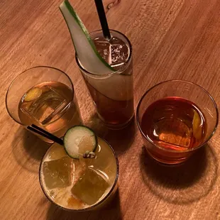 La perla old fashioned (left), peacekeeper (top), Benton old fashioned (right), mezcal mule (bottom)