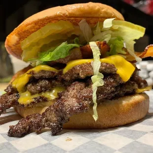 Pleasure burgers, with an added patty, bacon and pickles!