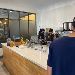 a man and a woman in a coffee shop