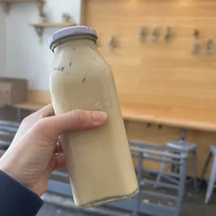 Sea Salt Cream Oolong Tea in glass bottle (post-shaken)