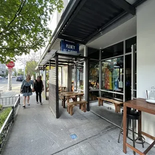 Patio seating on the sidewalk