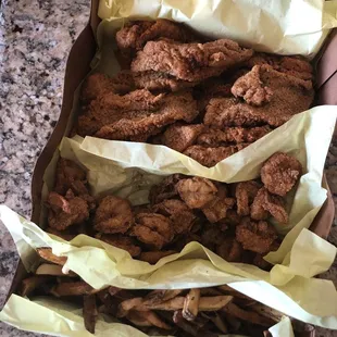 Family meal with catfish, shrimp and oysters.