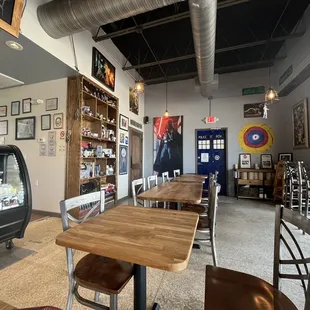 Seating area with ample sci-fi memorabilia on the bookshelf