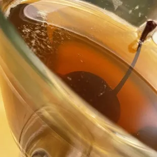 a cup of tea with a spoon in it