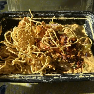 Khao Soi. I forgot to take the photo before starting to eat but the container was packed full!