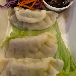 Steamed mixed pork/shrimp/vegetable dumplings with ginger sauce.