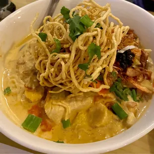 Khao Soi--traditional dish of northern Thailand--coconut curry sauce, egg noodles and other goodies, topped with crunchy noodles.