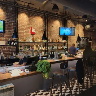 people sitting at a bar