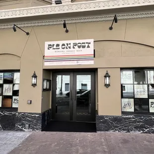 the entrance to a restaurant