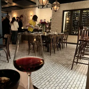 a glass of wine on a table