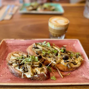 Mushroom Toast with pickled red onions on toasted Acme sourdough