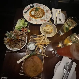 chili bowl, Mac and Yease, Buffalo Portobello Burger, crispy mushroom lettuce wraps, and a paloma