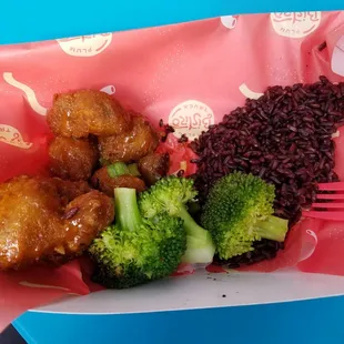 General Tso&apos;s Cauliflower w/ forbidden rice and broccoli.