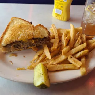 Patty melt, soggy fries, and a nice pickle.