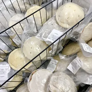 a basket full of cheeses