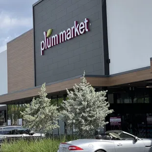 a car parked in front of the store