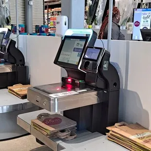 a cash register and a checkout machine