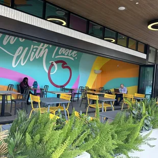 outside seating area of the plum market