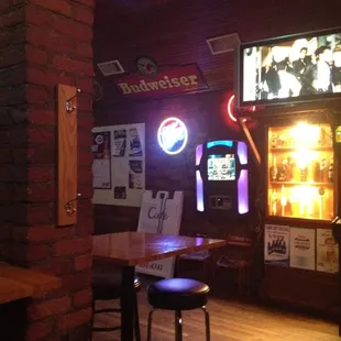 a bar with neon signs