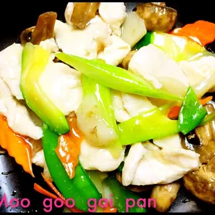 a stir fry with chicken and vegetables