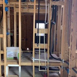 New gas line for furnace and water heater. Main water line with shut off valve.