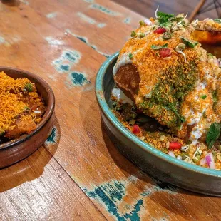 two bowls of food on a table