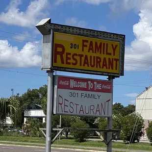 a sign for plummers family restaurant
