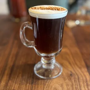 IRISH COFFEE (it has nuts on top not sugar). Hold my nuts please.