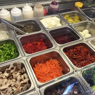 a variety of salads and condiments