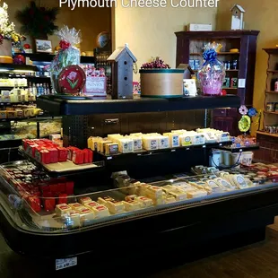 a variety of cheeses on display