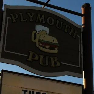 the sign for plymouth pub