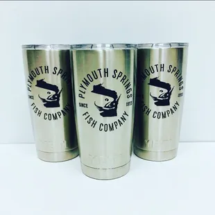 three stainless tumblers
