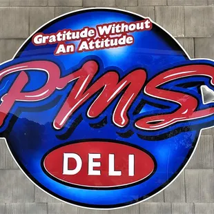 This is their logo outside the entrance to the restaurant.  Photo taken July 3, 2021.