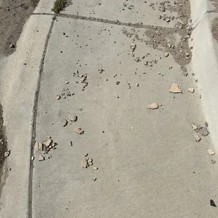 PNM and Wilson Company after math of pole installations pushing debris into walk paths