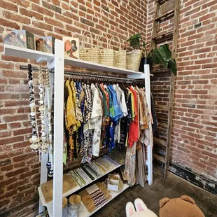 The brick walls... behind the vintage clothing