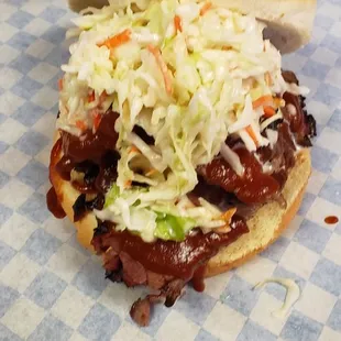 Beef brisket sandwich with slaw on top