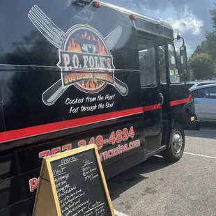 a food truck parked in a parking lot
