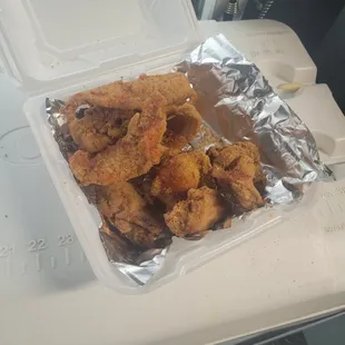 a tray of fried chicken