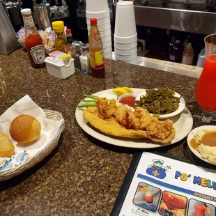 ws a plate of fried chicken, mashed potatoes, and gravy